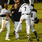 Nate Orf celebrates with Missions teammates after his walk-off sacrifice fly in the 12th inning on Saturday at Wolff Stadium. - photo by Joe Alexander