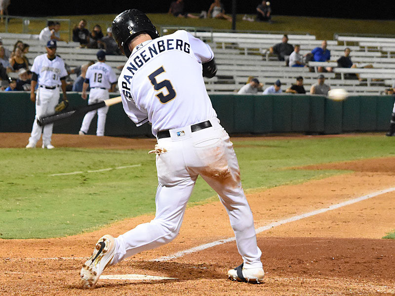 The Missions' Cory Spangenberg delivers a hit that tied the game in the 12th inning Saturday night at Wolff Stadium. - photo by Joe Alexander