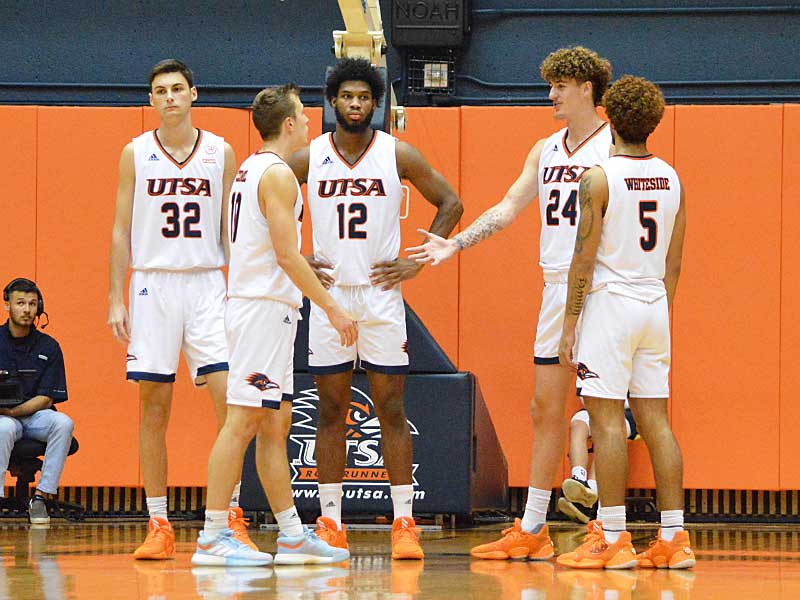 UTSA's Austin Timperman (32), Eric Czumbel (10), Phoenix Ford (12), Jacob Germany (24) and Makani Whiteside (5). The Roadrunners beat Texas A&M International 89-60 in an exhibition game on Wednesday, Oct. 30. 2019 at the UTSA Convocation Center. - photo by Joe Alexander