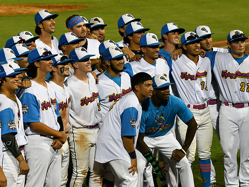 Flying Chanclas players gather for a photo after their game July 29 at Wolff Stadium. - photo by Joe Alexander