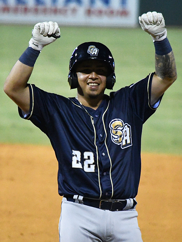It was this kind of night for the San Antonio Missions and for Juan Fernandez. The Missions catcher celebrates one of his three hits in Tuesday's opening night victory. - photo by Joe Alexander