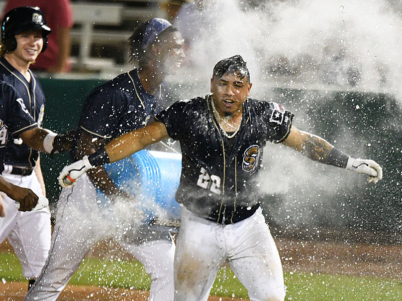 The San Antonio Missions shower Juan Fernandez with ice water after he had the game-winning hit Wednesday night at Wolff Stadium. - photo by Joe Alexander