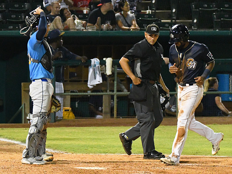 The Missions' Allen Cordoba scores in the bottom of the sixth inning to tie it 4-4 in Wednesday's second game at Wolff Stadium. - photo by Joe Alexander