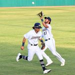 San Antonio Missions right fielder Agustin Ruiz catches a short fly ball behind Missions second baseman Ethan Skender on Saturday at Wolff Stadium. - photo by Joe Alexander