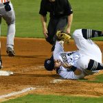 San Antonio Missions first baseman Kyle Overstreet tumbles after tagging the base for a force out on Wednesday at Wolff Stadium. - photo by Joe Alexander