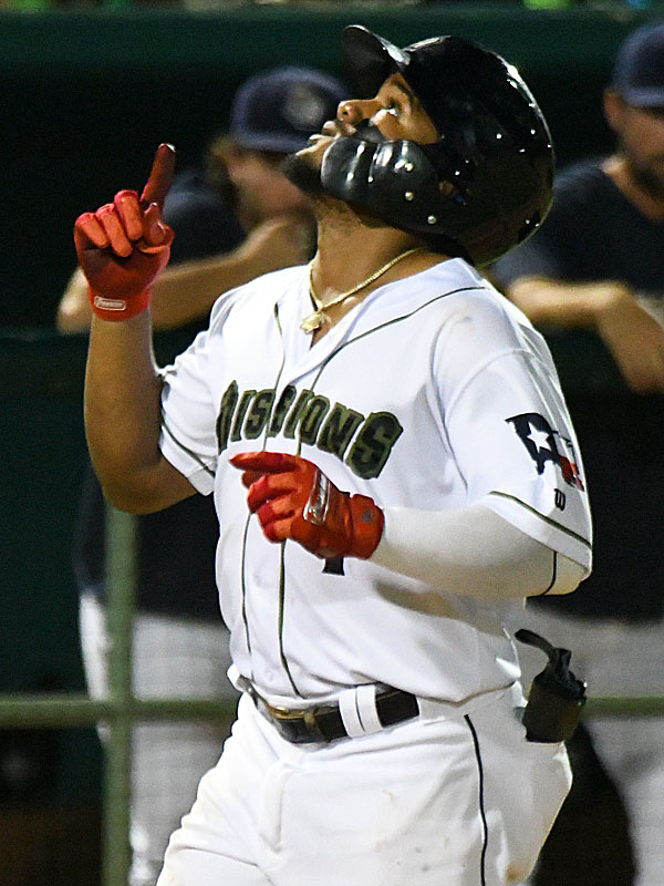 San Antonio Missions shortstop Eguy Rosario celebrates before touching home plate on his eighth-inning home run on Friday at Wolff Stadium. - photo by Joe Alexander