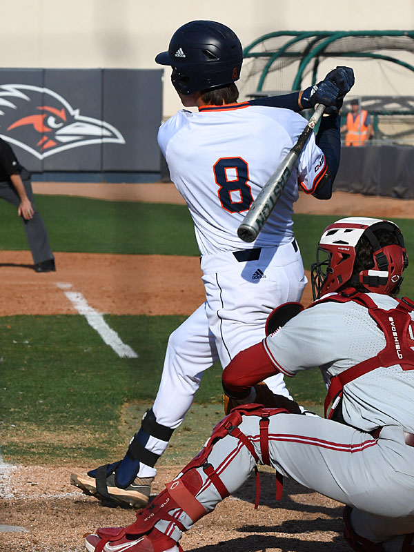 Leyton Barry hits the ball into the outfield in the last inning in UTSA's 6-5, 10-inning victory over No. 2 Stanford on Monday, Feb. 28, 2022 at Roadrunner Field. - photo by Joe Alexander