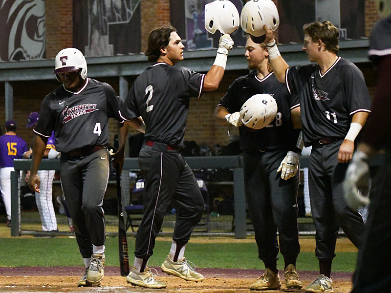 Colt Harris celebrates at the plate after hitting a go-ahead grand slam against Mary Hardin-Baylor on Tuesday in San Antonio. - photo by Joe Alexander