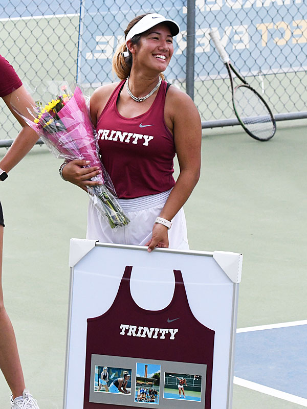 Megan Flores is honored on Trinity tennis senior day on Friday, April 15, 2022. - photo by Joe Alexander