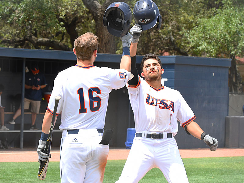 Jonathan Tapia (right) celebrates at home after hitting a home run in the seventh inning. UTSA beat Florida International 9-8 on Sunday, April 24, 2022, at Roadrunner Field in San Antonio. - photo by Joe Alexander