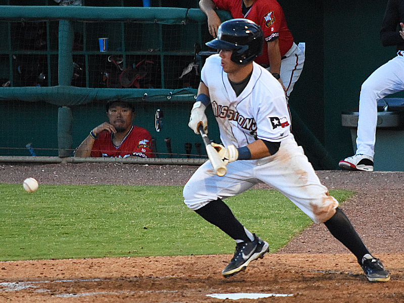 Ripken Reyes bunts for a run-scoring hit in the fifth-inning. The San Antonio Missions beat the Wichita Wind Surge 5-4 on Friday, June 9, 2023, at Wolff Stadium. - photo by Joe Alexander
