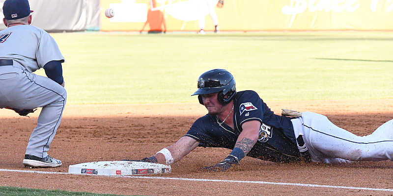 Jackson Merrill slides into third base for a triple in his first at-bat in his Missions debut. The San Antonio Missions beat the Northwest Arkansas Naturals on Friday, July 14, 2023, at Wolff Stadium. - photo by Joe Alexander