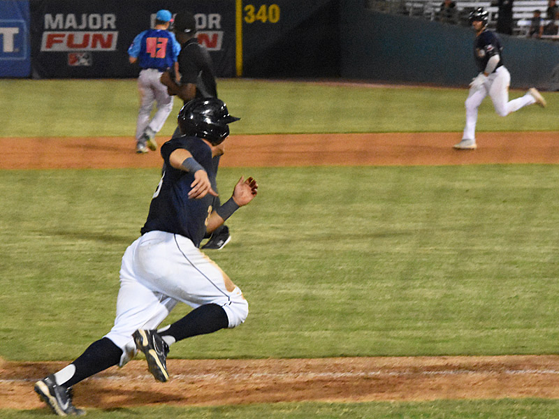 Ripken Reyes heads home with the winning run on a walk-off single by Graham Pauley (top right) in the 10th inning of the San Antonio Missions' 6-5 victory over the Amarillo Sod Poodles on Saturday, Aug. 26, 2023, at Wolff Stadium. - photo by Joe Alexander. 