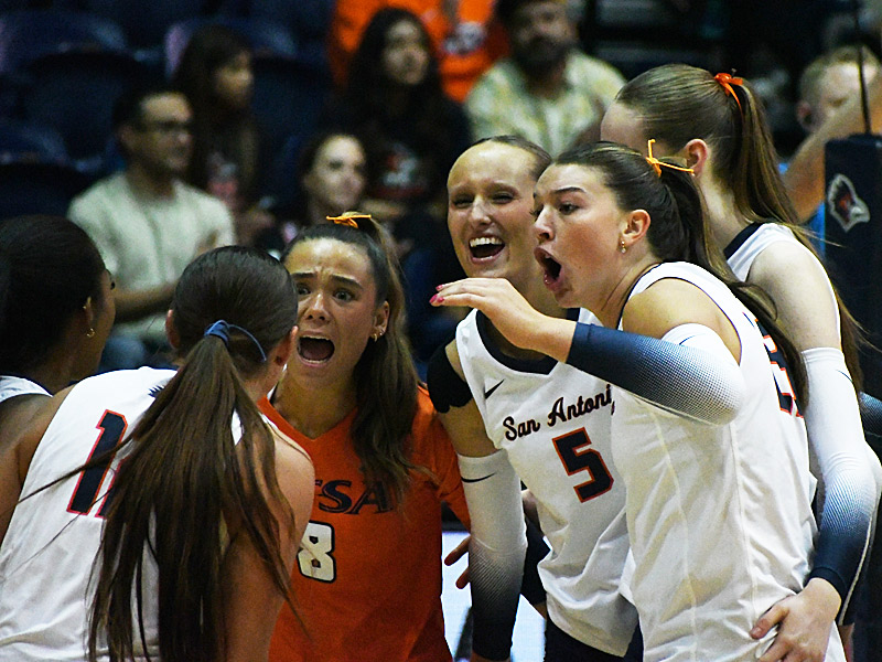 UTSA volleyball players celebrate after winning a point against North Florida on Friday in the Roadrunner Classic at the Convocation Center. - photo by Joe Alexander