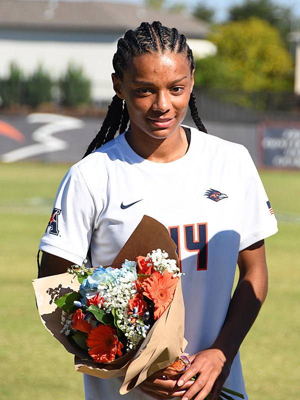 Izzy Lane is honored after Sunday's final home soccer game of the season at Park West. - Photo by Joe Alexander